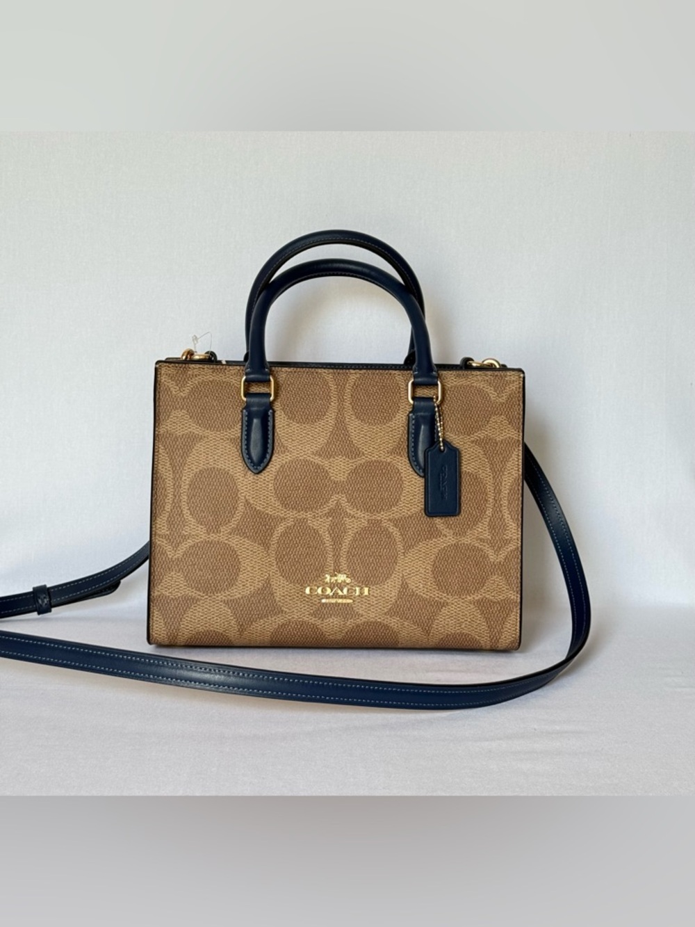 Coach Maggie Small Tote 
Signature Canvas Tan/deep blue Gold hardware